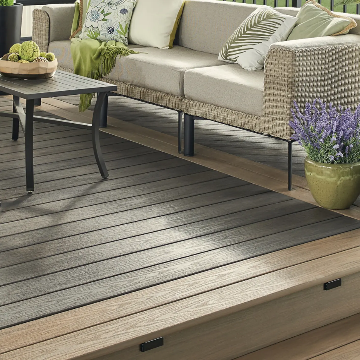 A wolf deck customized floor with a fully decorated sofa and table.
